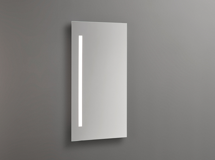 Mirrors with vertical lighting